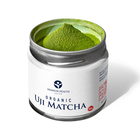 Open 50g tin of Premium Health Japan Organic Uji Matcha, showing vibrant green matcha powder with smooth, fine texture.
