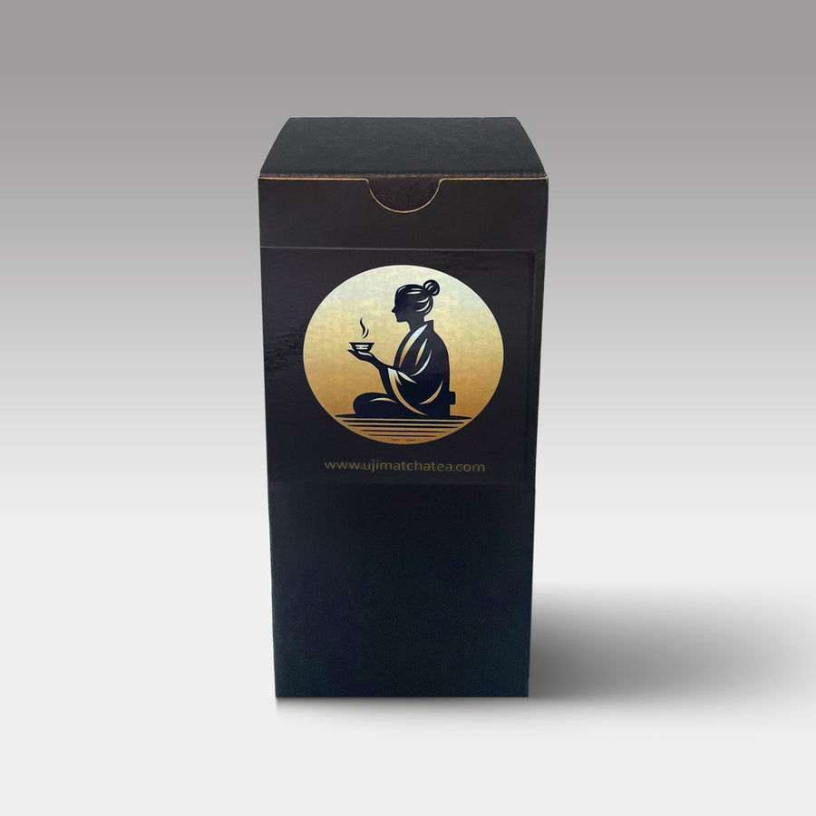 Premium Health Japan matcha whisk set outer box with black and gold design, featuring traditional tea ceremony logo