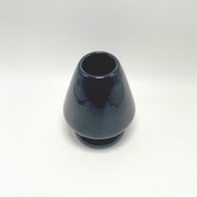 Glossy black ceramic matcha whisk holder designed to maintain chasen shape and extend whisk life.