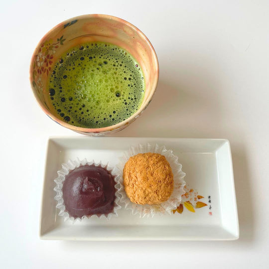 Matcha tea in a chawan and Japanese sweets