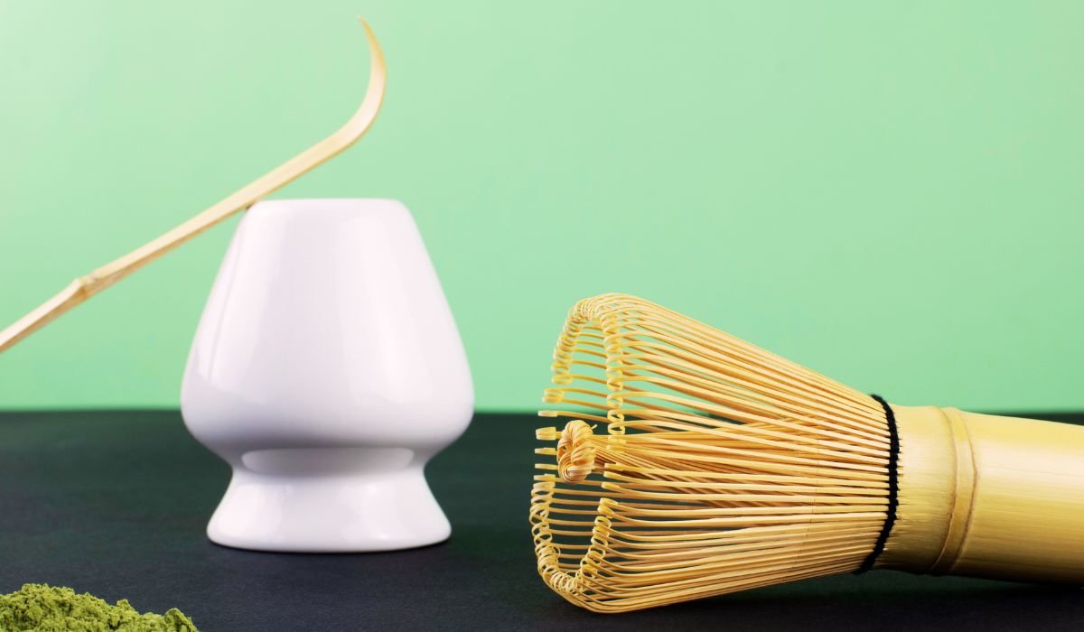 Image of a bamboo scoop, a bamboo whisk, and a matcha whisk holder