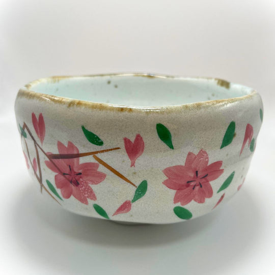 Product image of our hand painted, Japanese crafted Sakura Matcha Tea Bowl (side view)