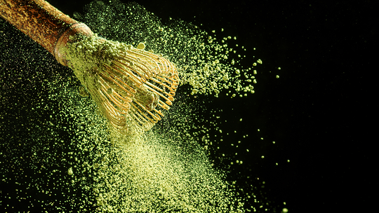 Bamboo matcha whisk shaking off matcha powder