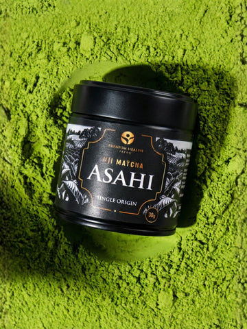 Asahi cultivar Uji matcha 30 g black jar on vivid green matcha powder