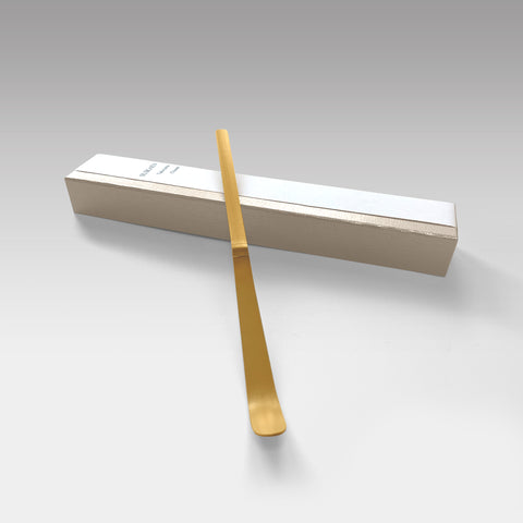 Suikaen bamboo chashaku tea scoop placed on elegant gift box, handcrafted in Takayama, Japan.