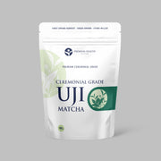 Ceremonial Grade Uji Matcha 100 g pouch by Premium Health Japan, showing first spring harvest, shade-grown and stone-milled matcha packaging.