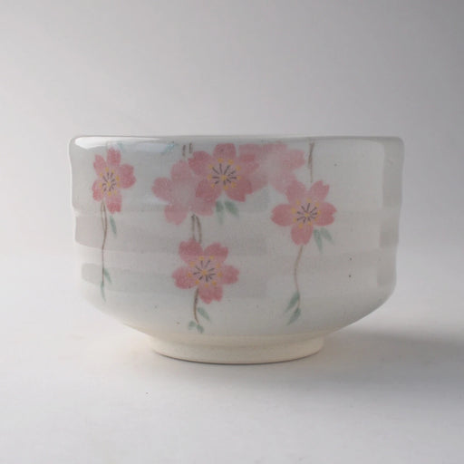Cherry blossom matcha bowl with soft pink sakura design, handcrafted Japanese chawan for traditional tea ceremony