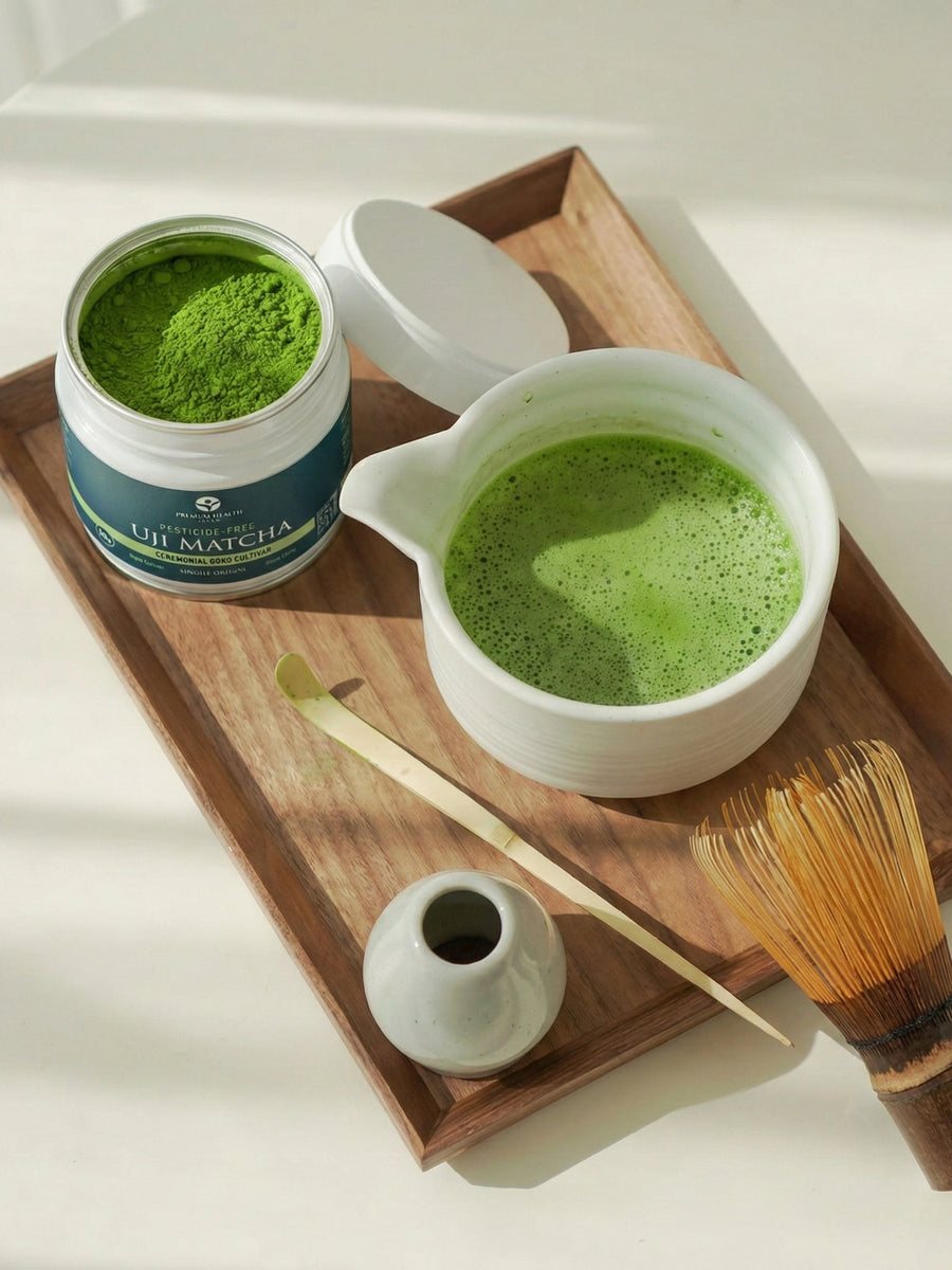 Uji Gokō matcha prepared in bowl with bamboo whisk and tea tools