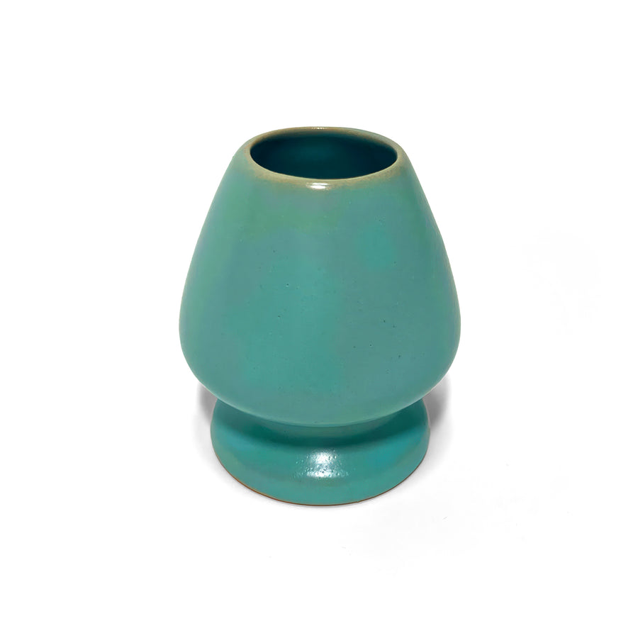 Japanese ceramic matcha whisk holder in green-blue glaze, designed to maintain chasen shape and prolong durability