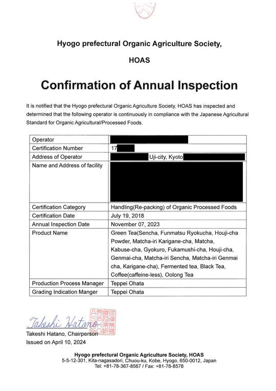 Organic JAS annual inspection certificate issued by Japan's Hyogo Prefectural Organic Agriculture Society (HOAS), confirming continued certification for organic processed green tea including matcha. Operator details redacted.