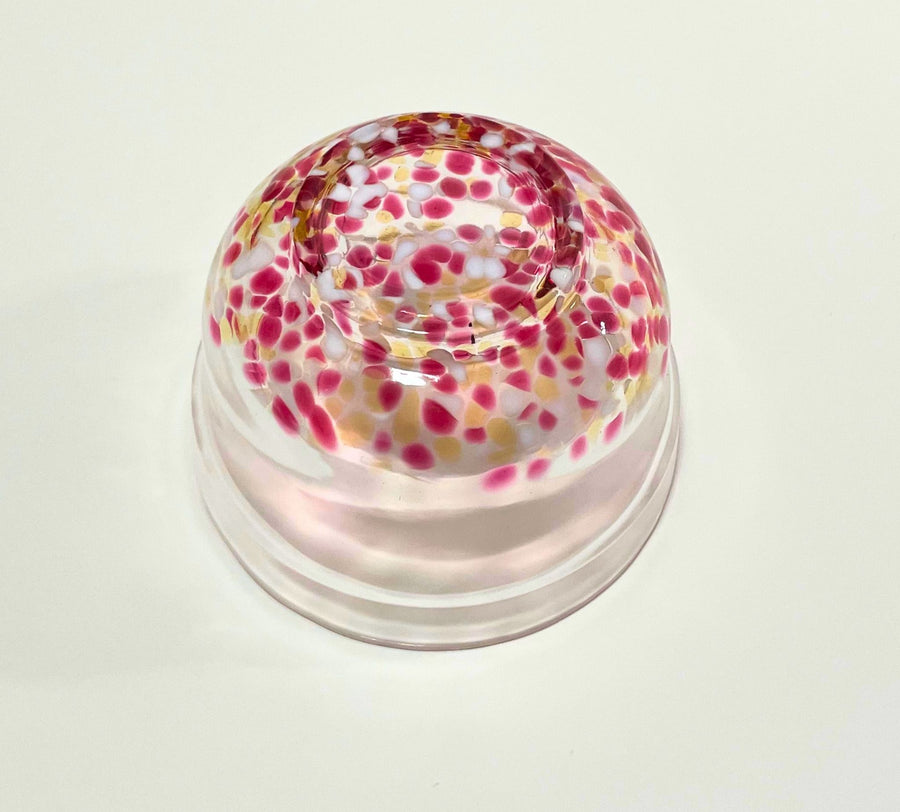 Bottom view of Japanese glass matcha bowl with pink and white plum blossom pattern