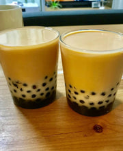 Bubble tea made with Okinawa Brown Sugar Syrup (Kokuto Mitsu), featuring chewy tapioca pearls and authentic Japanese black sugar sweetness.