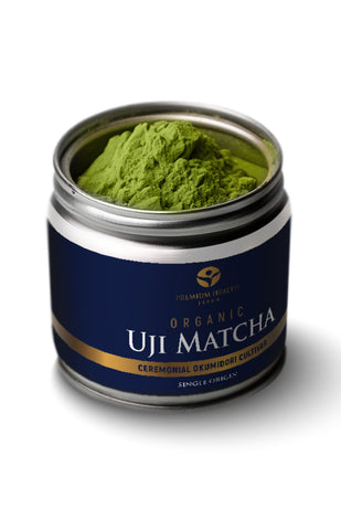 Open tin of organic Uji matcha powder, ceremonial Okumidori cultivar by Premium Health Japan.