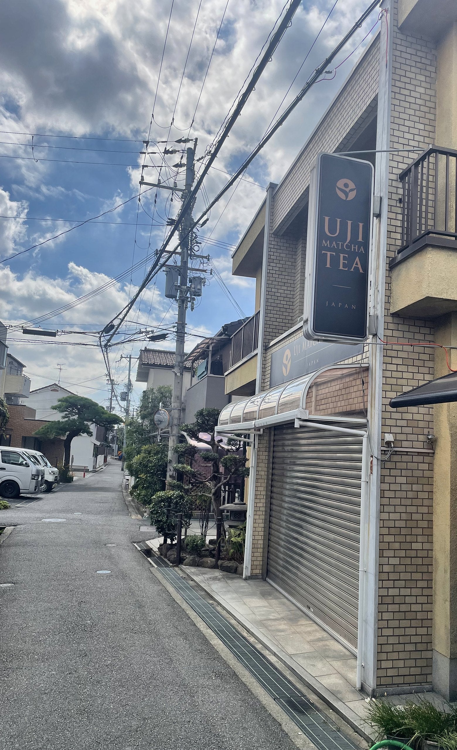 Uji Matcha Tea hanging sign seen from the street in Kaizuka